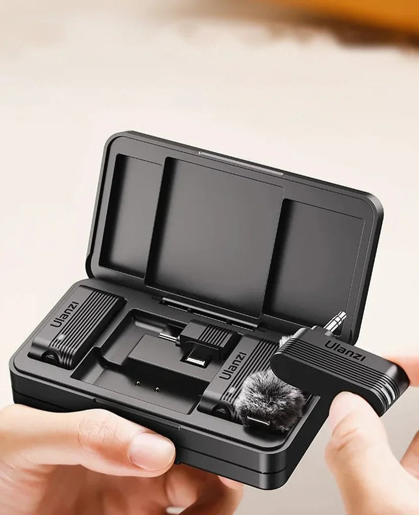 A Mic transmitter held in the hand
