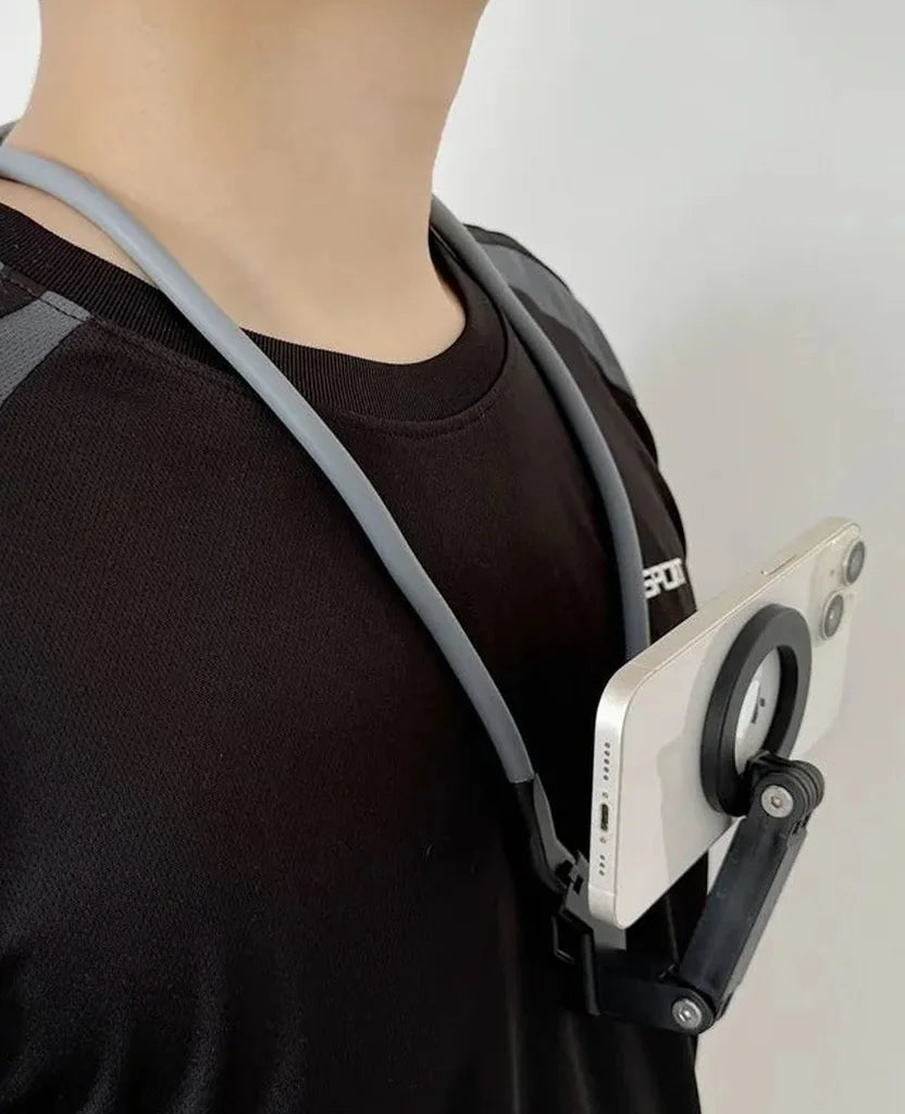 The Strap worn, holding a phone at chest height